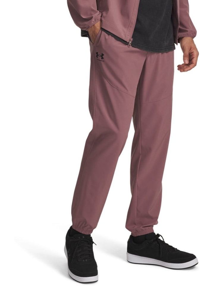 

Спортивные брюки Vibe Woven Jogger коричневого цвета Under Armour