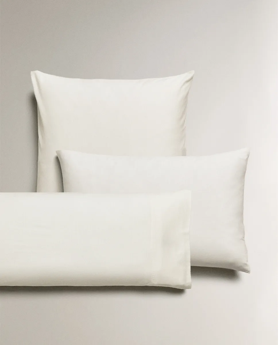 

Наволочка из хлопкового джерси Zara Home, экрю