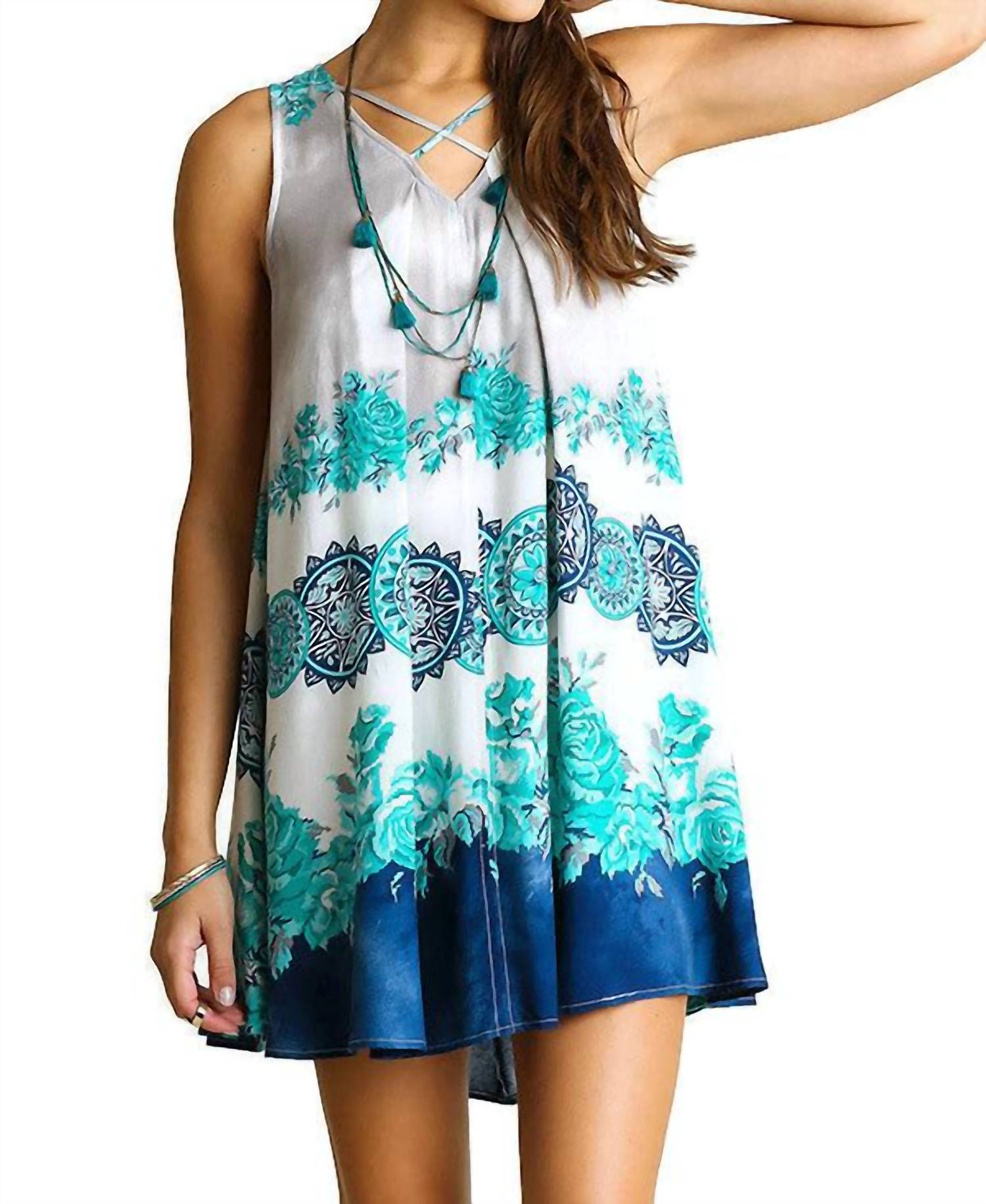 

Бирюзово-синее платье без рукавов с цветочным принтом и перекрещенным вырезом Umgee