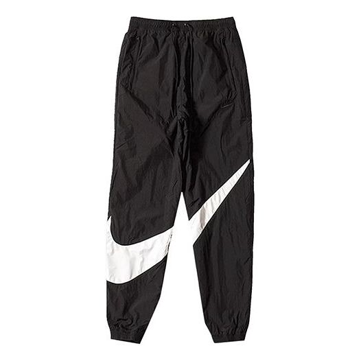 

Брюки big swoosh sportswear woven long pants sports pants us edition black Nike, черный