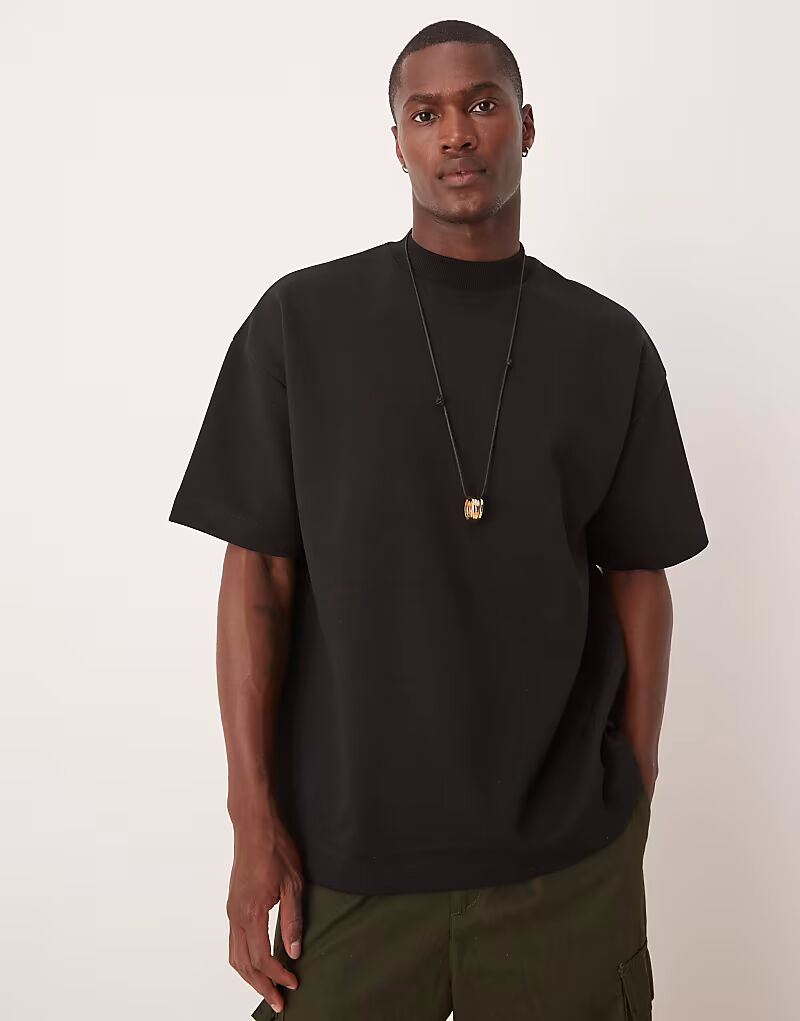 

Футболка свободного кроя ASOS DESIGN из интерлока с высоким воротом и спущенным плечом черного цвета