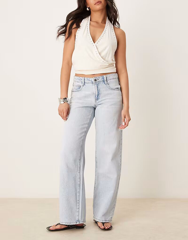 

Джинсы с заниженной талией и широкими штанинами светло-голубого цвета Gina Tricot