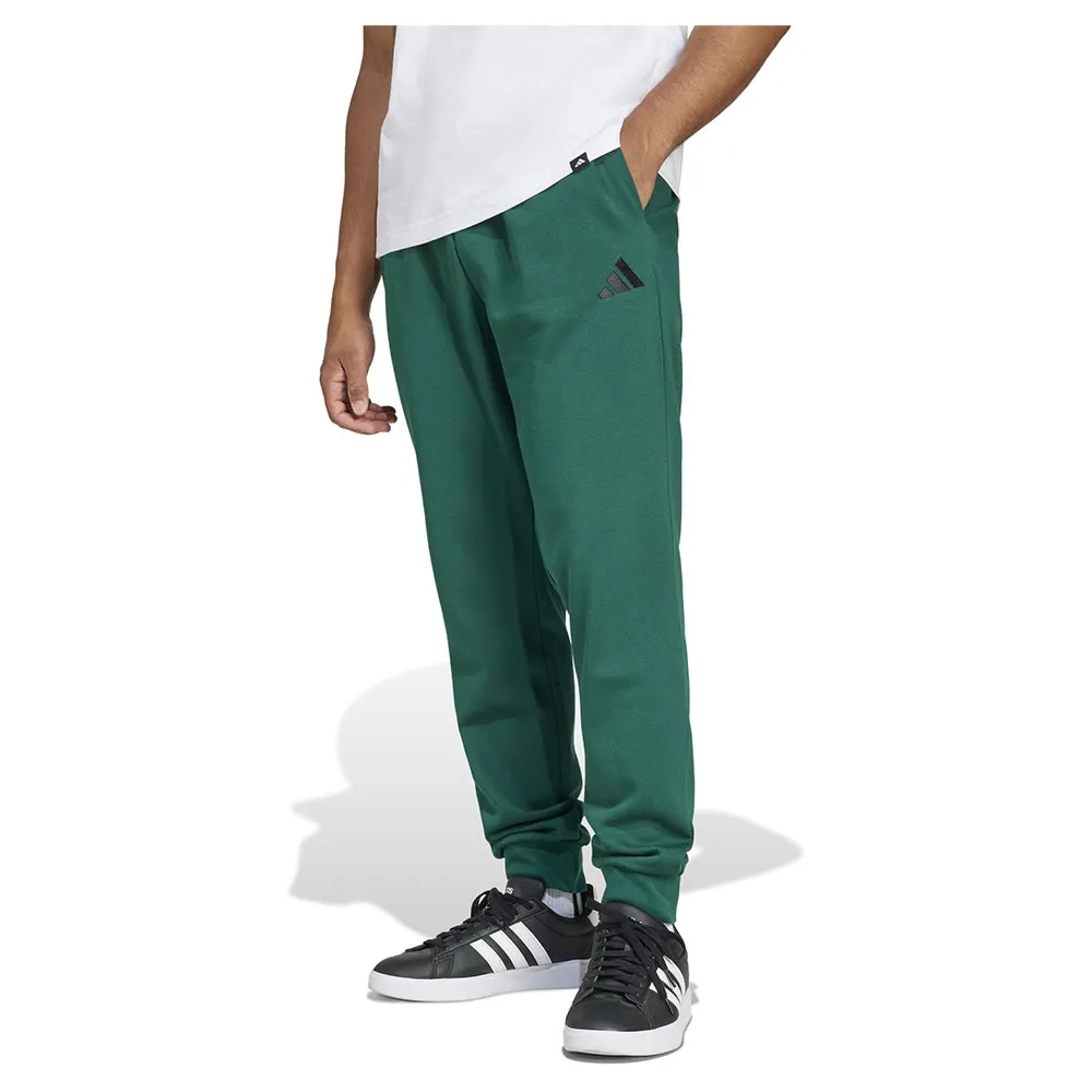 

Джоггеры adidas Essentials Feelcozy Fleece, зеленый