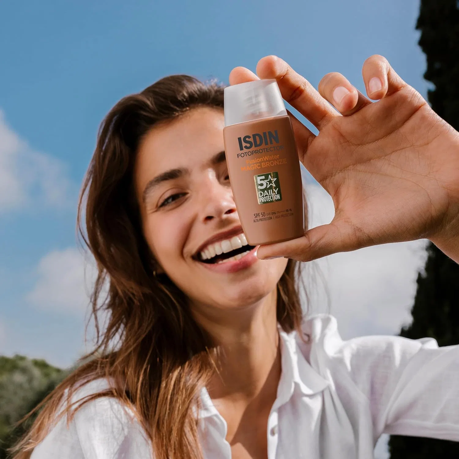 Тонирующий солнцезащитный крем для лица ISDIN Fusion Water Magic Colour Bronze SPF 50 Isdin — фото 2