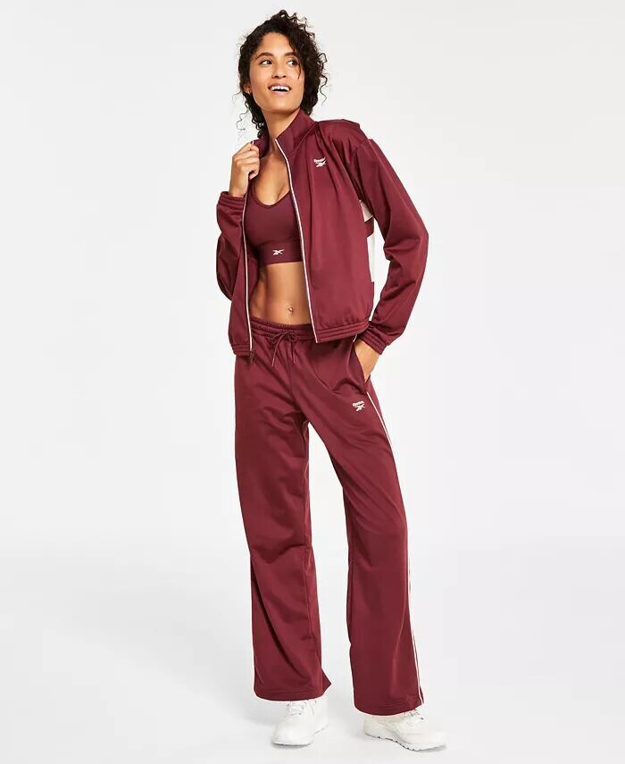

Женская трикотажная спортивная куртка, спортивный бюстгальтер Tri Back Medium Impact и трикотажные брюки Reebok, фиолетовый