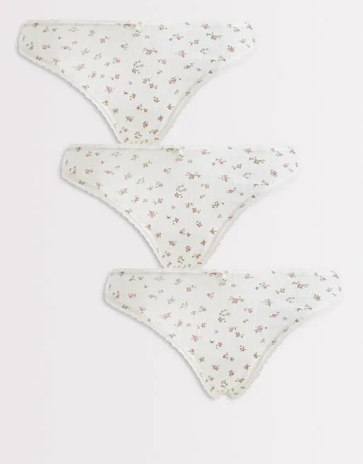 

Набор из трех трусов-стрингов кремового цвета Lindex с цветочным принтом-пуантеллем