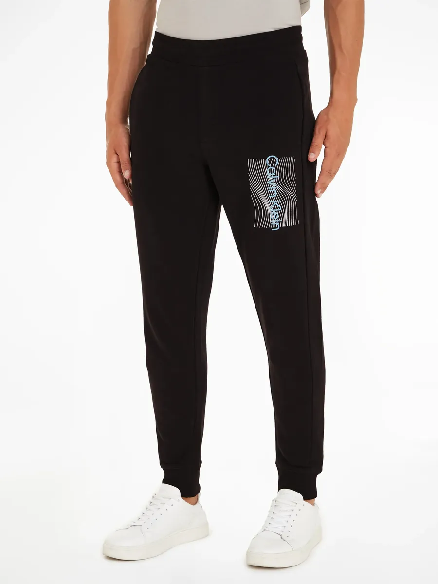 

Спортивные брюки Calvin Klein "WAVE LINES HERO LOGO SWEATPANTS" с фирменной этикеткой, цвет Ck Black