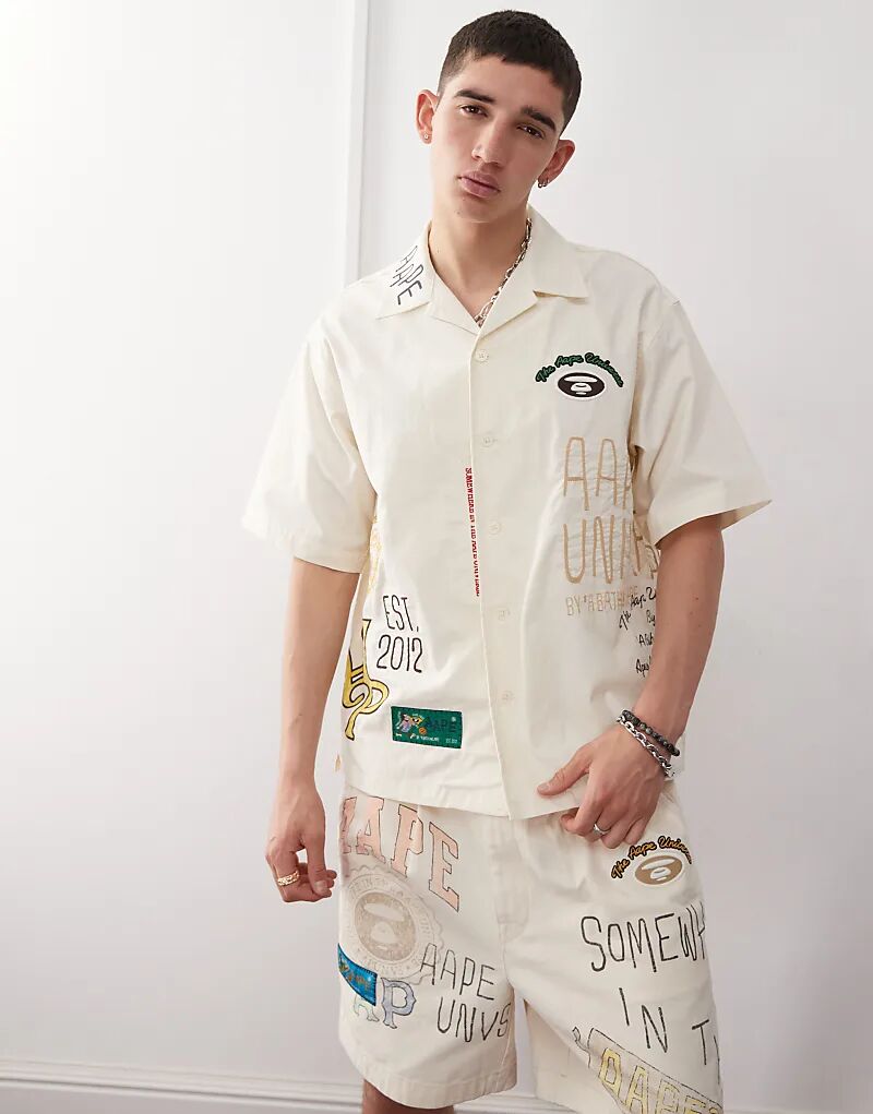 

Футболка с короткими рукавами и логотипом Aape By A Bathing Ape бежевого цвета Aape By A Bathing Ape