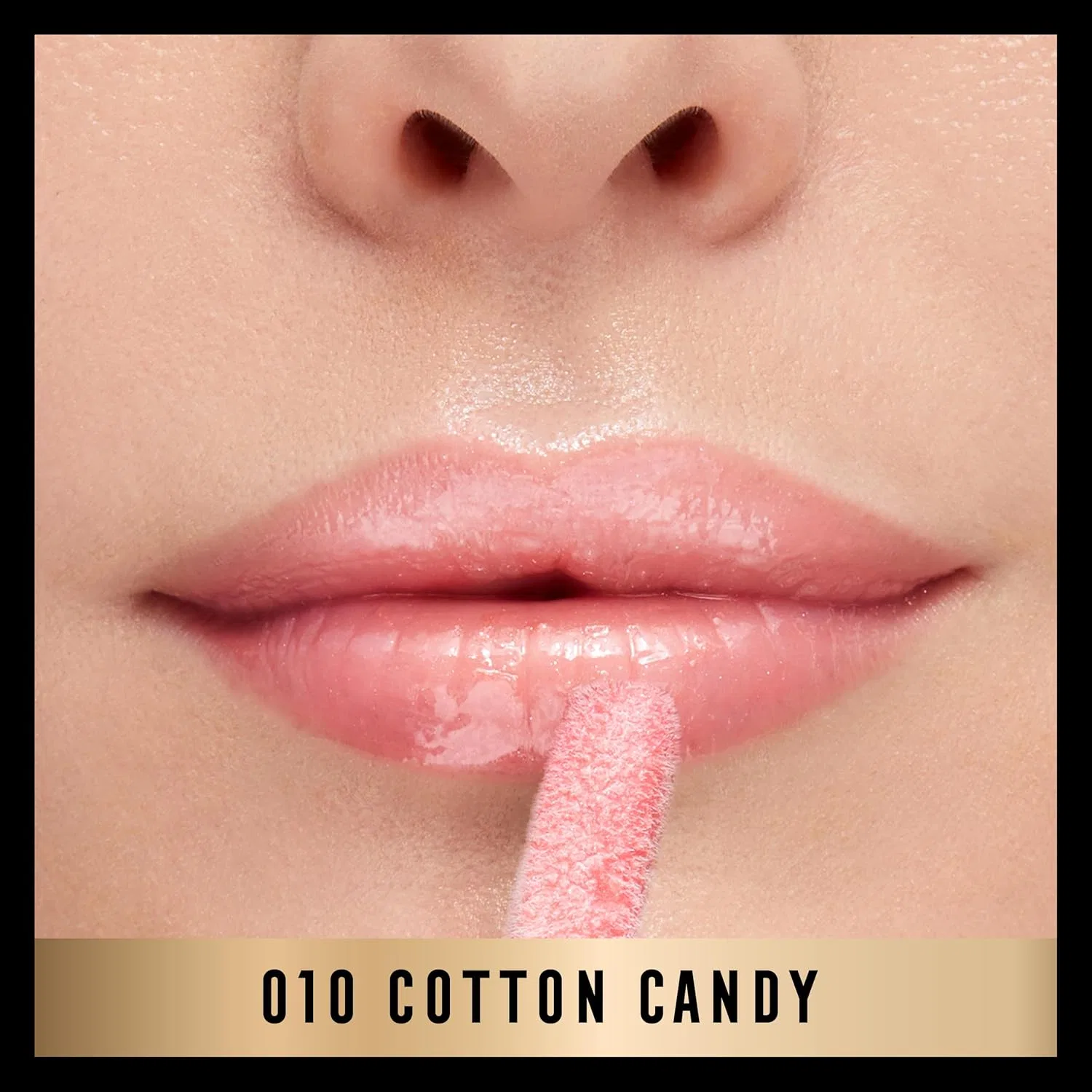 Цветной блеск для губ 2000 Calorie Lip Glaze «010 Cotton Candy» от Max Factor Max Factor, 010 Cotton Candy — фото 3