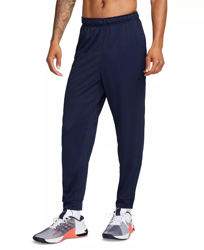 Мужские зауженные универсальные брюки Totality Dri-FIT Nike, синий