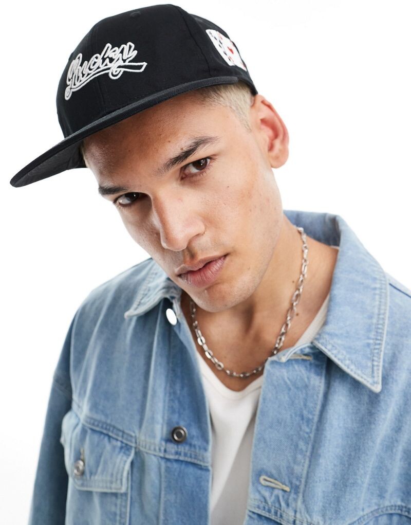 

Черная приталенная кепка с разноцветной вышивкой ASOS DESIGN