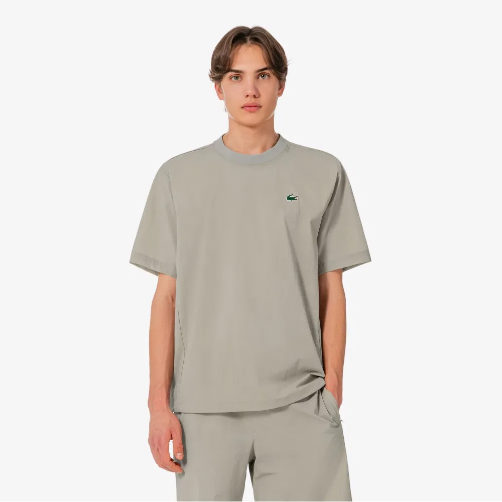 Мужская теннисная футболка-писте из тканого материала бежевого цвета от Lacoste — фото 4