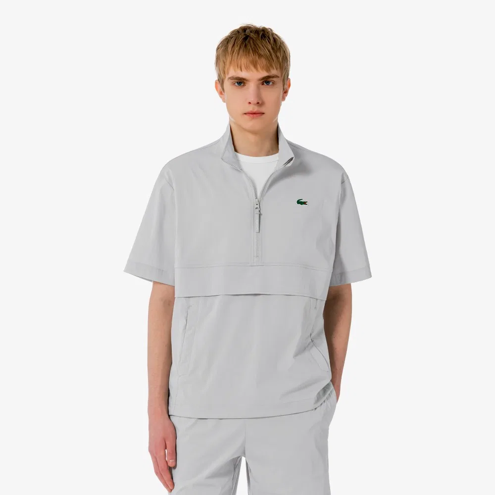 Мужской эластичный тканый анорак светло-серый от Lacoste