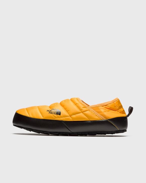 

Сандалии The North Face Thermoball Traction Mule V, цвет summit gold/tnf black