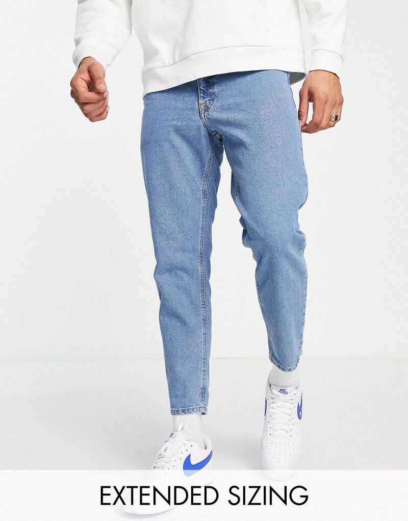

Классические синие жесткие джинсы средней степени стирки ASOS DESIGN