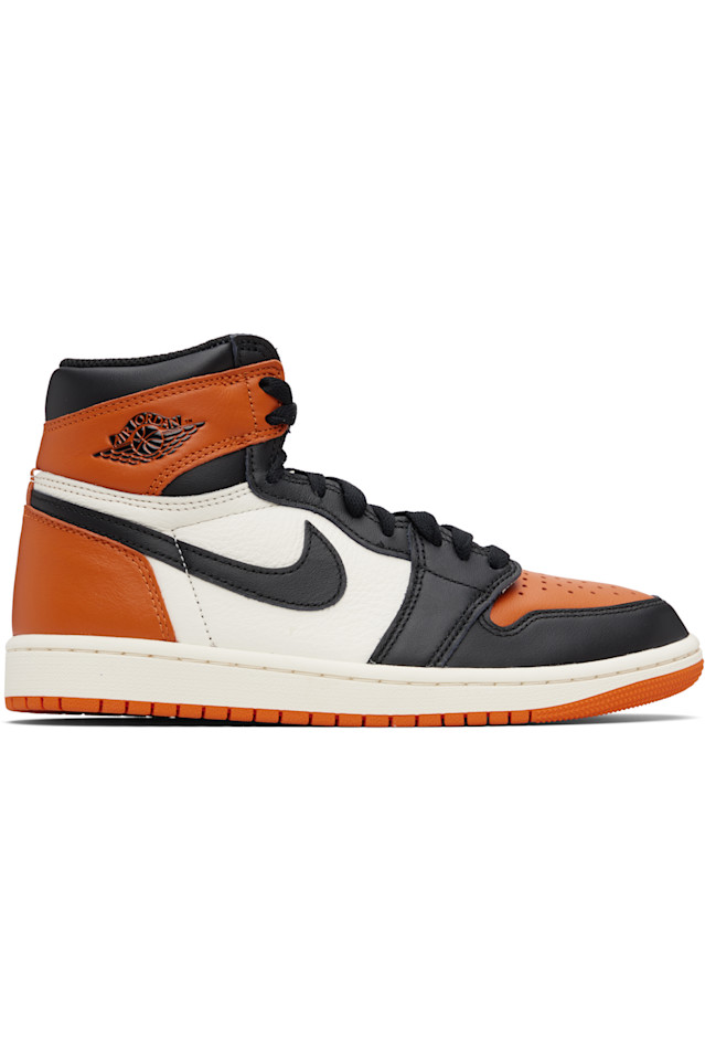 

Nike Jordan Оранжево-Черные кроссовки Air Jordan 1