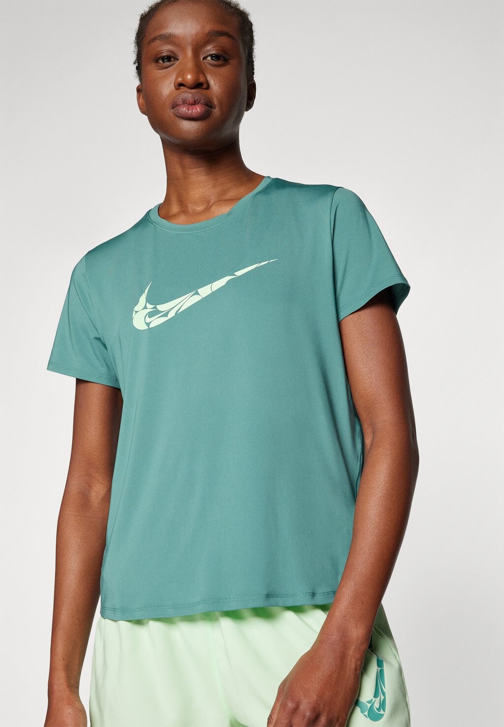 

Спортивный топ One Top Nike, бикостал/зеленый пар