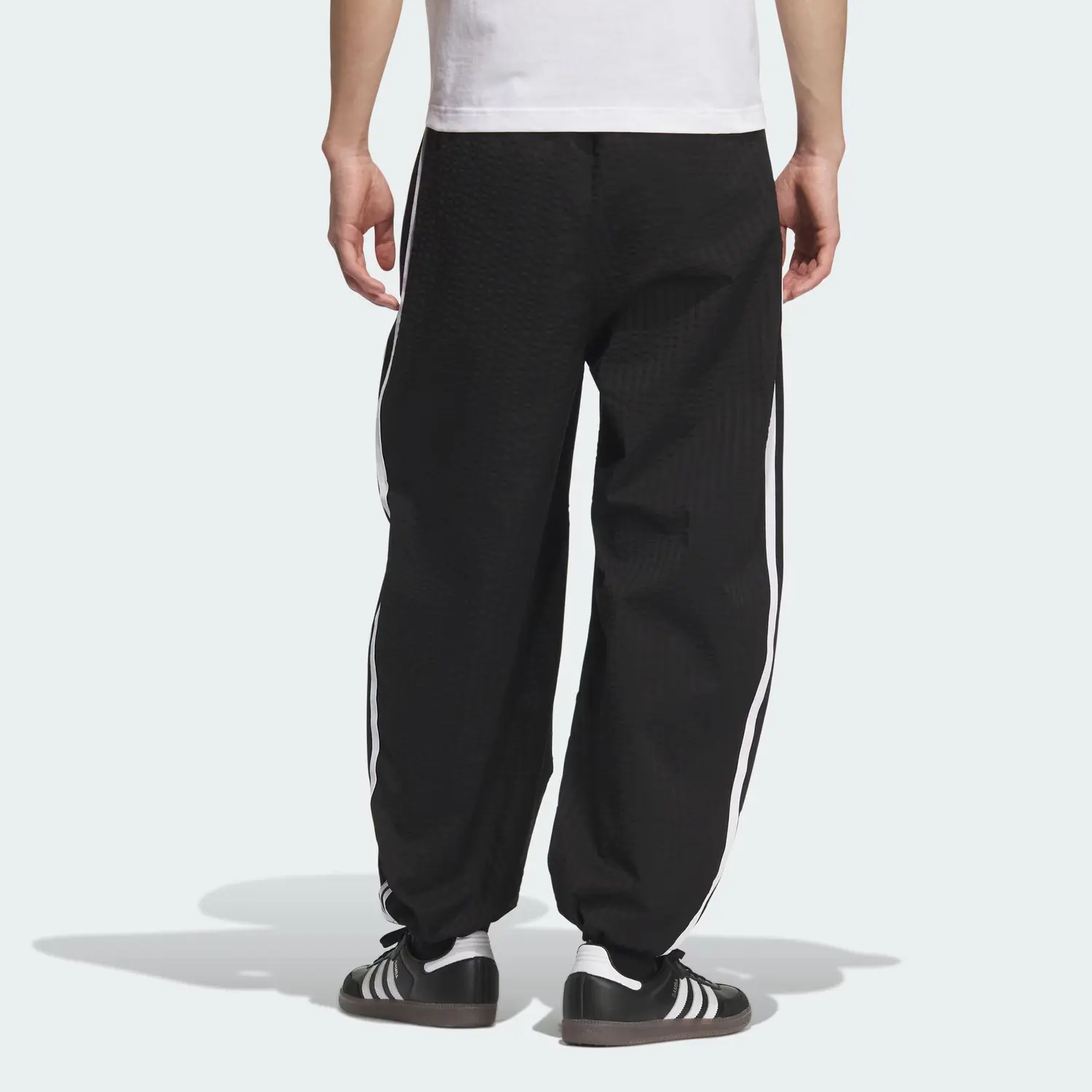 Зауженные спортивные брюки мужские Adidas Originals, черный — фото 3
