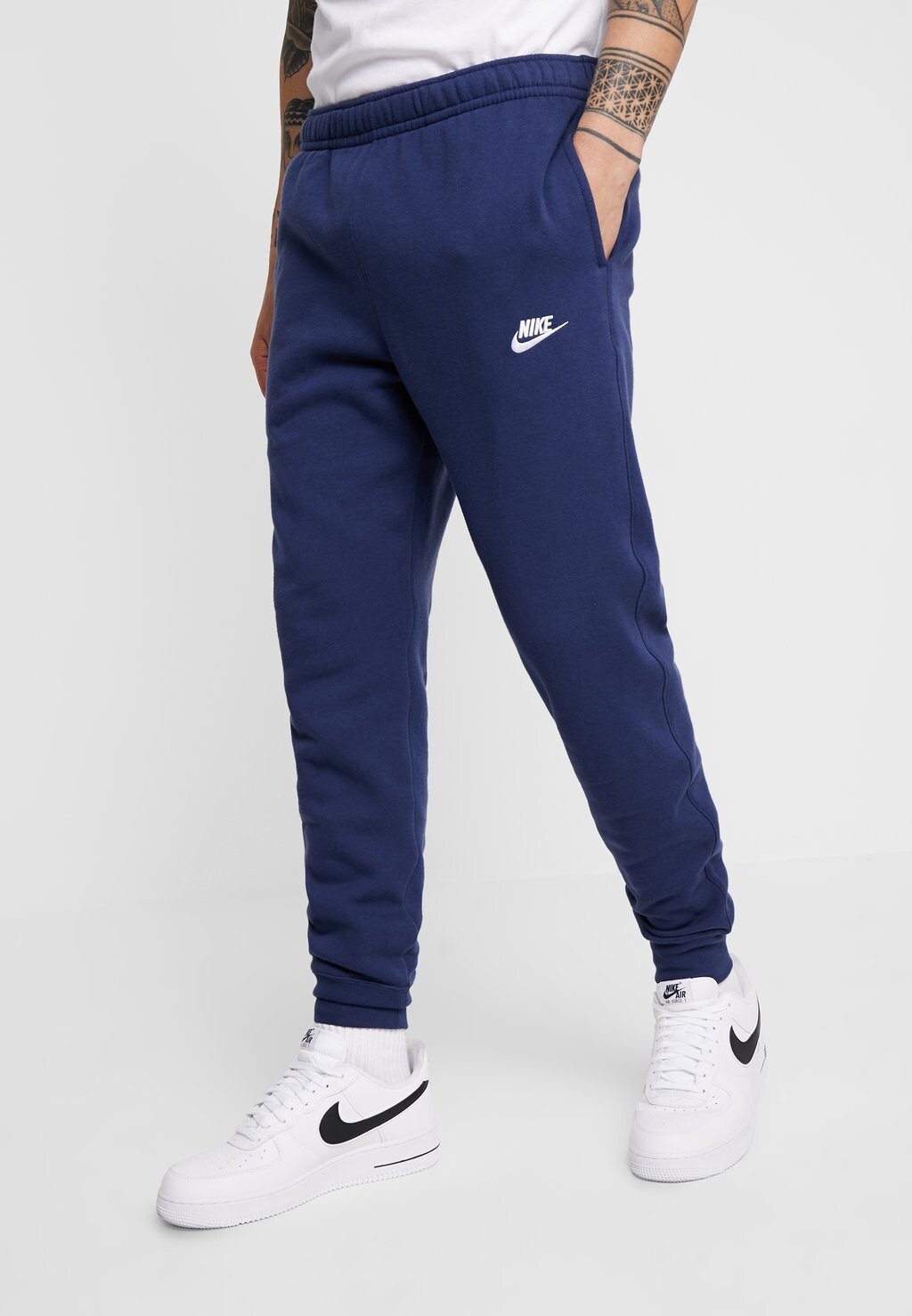 

Спортивные брюки темно-синего цвета Nike,