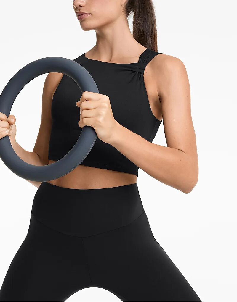 

Асимметричная майка Oysho Twist Comfortlux черного цвета