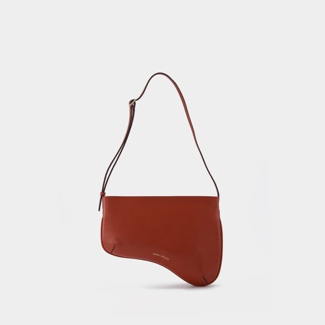 

Сумка Curve из эм кожи Manu Atelier, красный