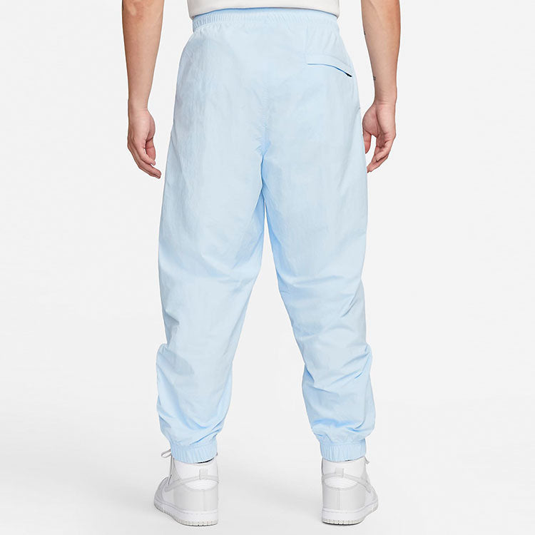 Спортивные брюки Nike Solo Swoosh Woven Track Pant 'Light Blue' DQ6572-441, синий — фото 3