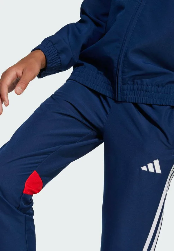 Детские спортивные штаны tiro 25 essentials из тканого материала Adidas Performance, Team Navy Red — фото 3