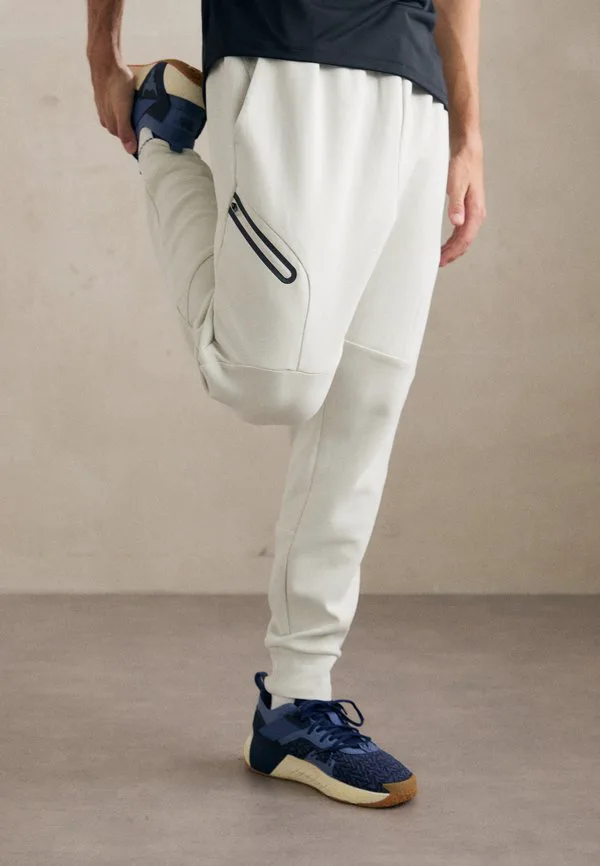 

Неудержимые флисовые спортивные штаны Under Armour, Summit White/Black