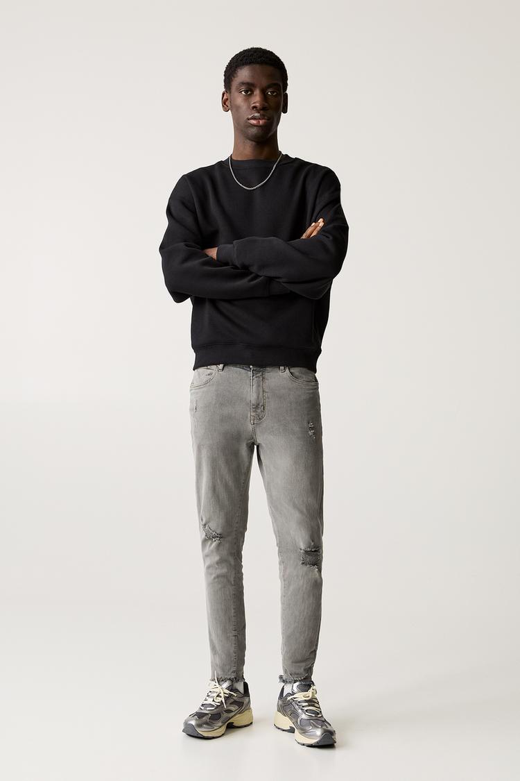 

Джинсы с рваными краями Pull And Bear, серый