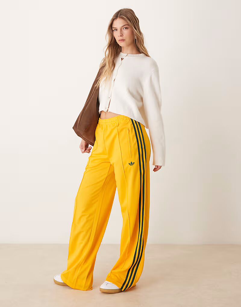 

Спортивные брюки Firebird Loose желтого цвета Adidas Originals