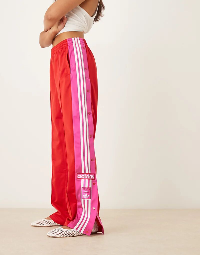 

Спортивные брюки adidas Original Adibreak красного и розового цветов Adidas Originals