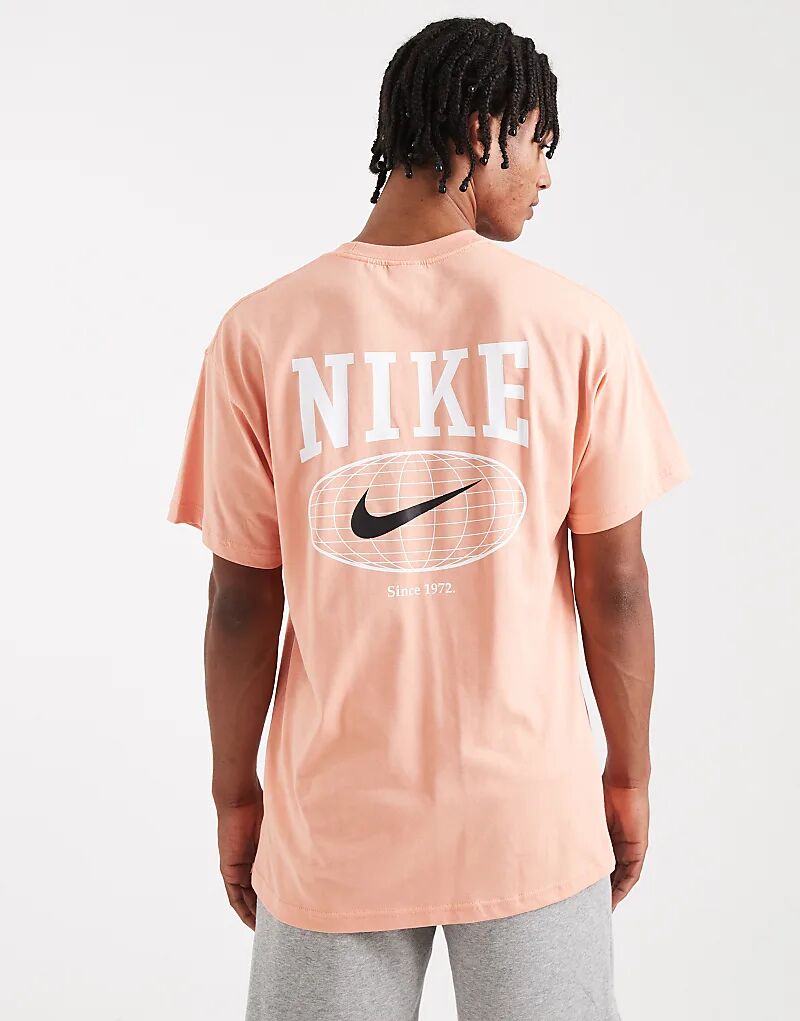 

Футболка с графическим принтом Nike Line Art оранжевого цвета