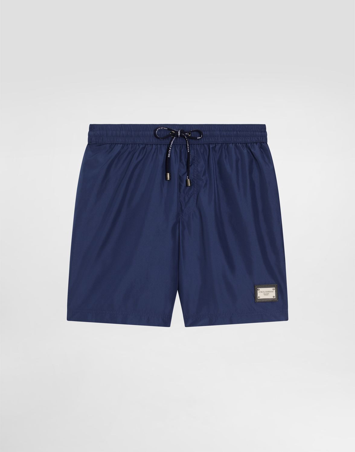 

Плавательные шорты средней длины с фирменной пластиной Dolce & Gabbana, синий