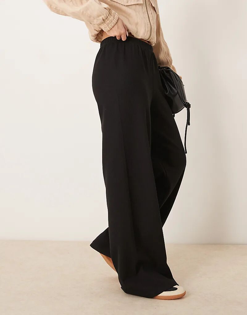 

Вафельные брюки широкого кроя черного цвета ASOS DESIGN