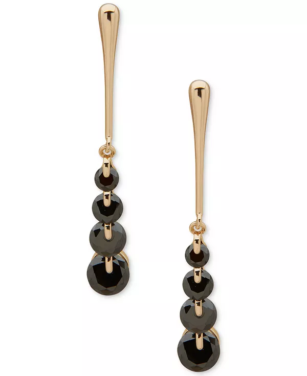 

Динамичные линейные серьги золотого оттенка с кубическим цирконием Anne Klein, jet