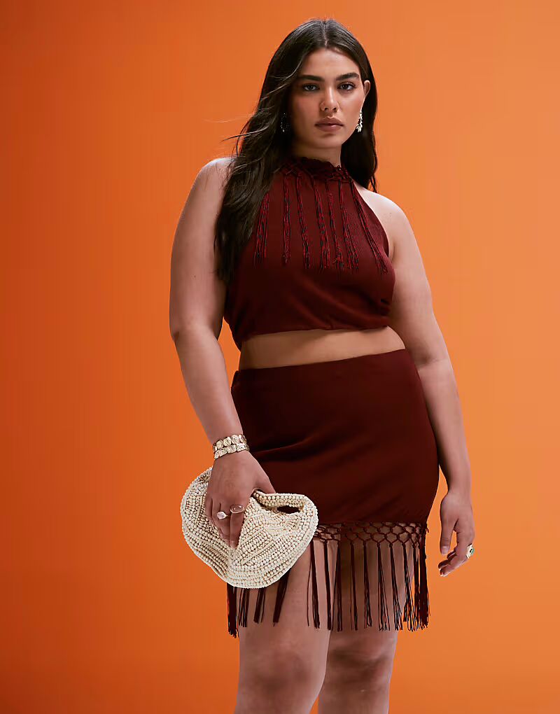 

Топ ASOS DESIGN Curve с халтер-воротником и бахромой в розовом цвете ASOS Curve