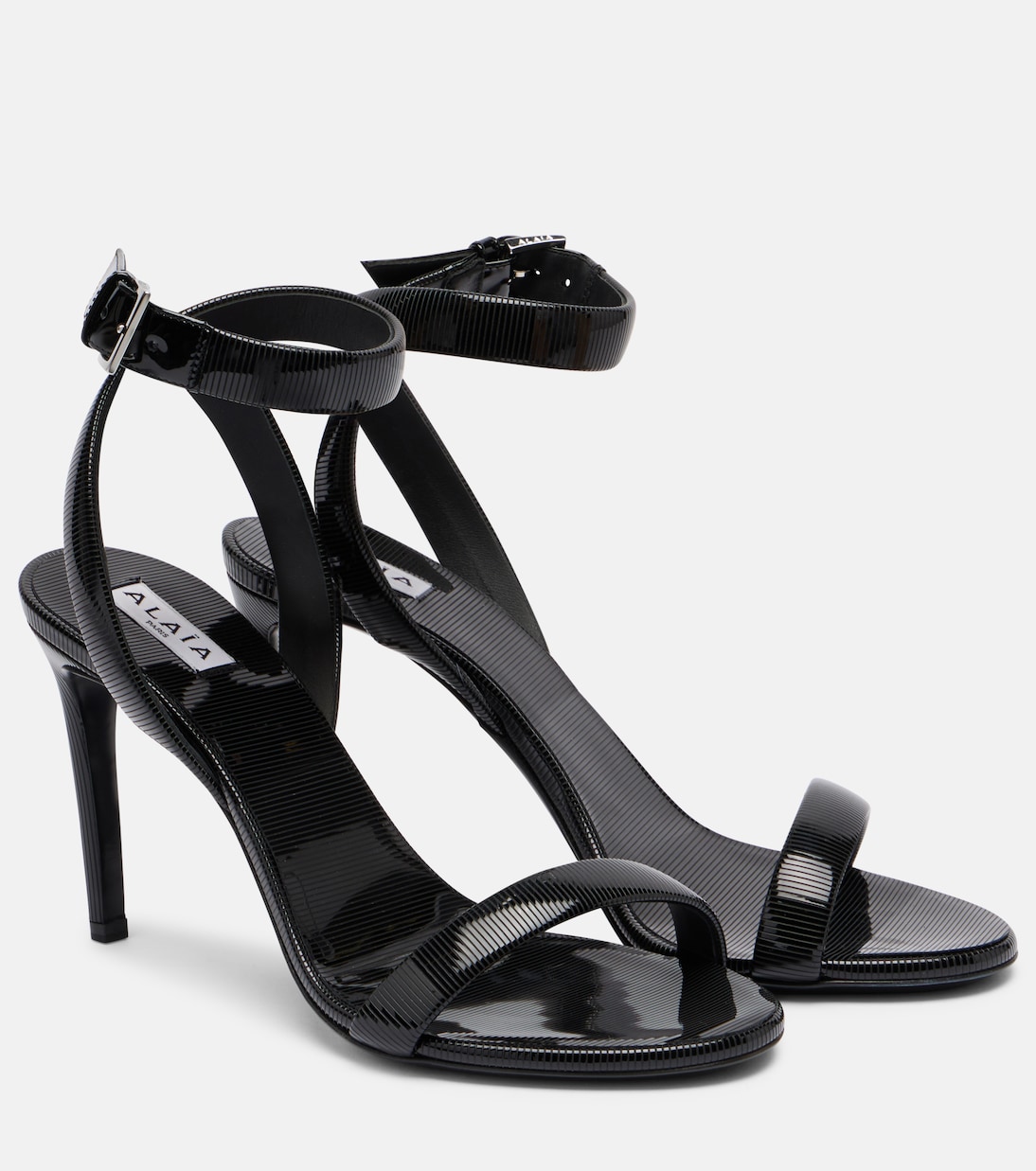 Цепочка сандалии из лаковой кожи в стиле тромплёй Alaïa, нуар