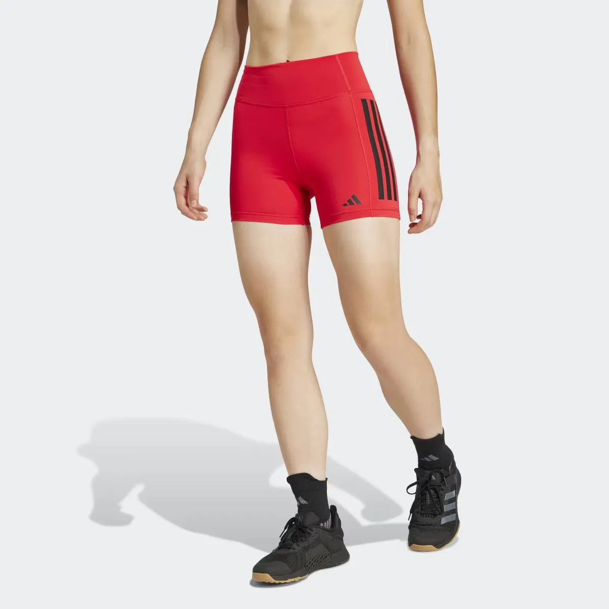 

Женские короткие леггинсы Adidas Optime 1/4 с тремя полосками, красный
