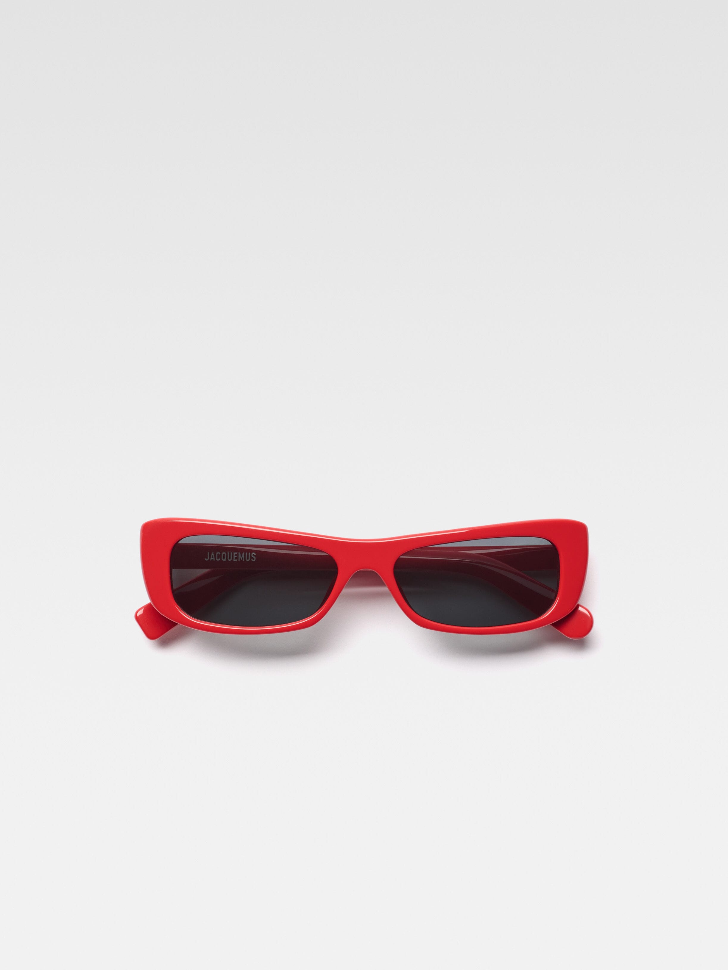 

Солнцезащитные очки «кошачий глаз» прямоугольной формы JACQUEMUS The Capri sunglasses, красный