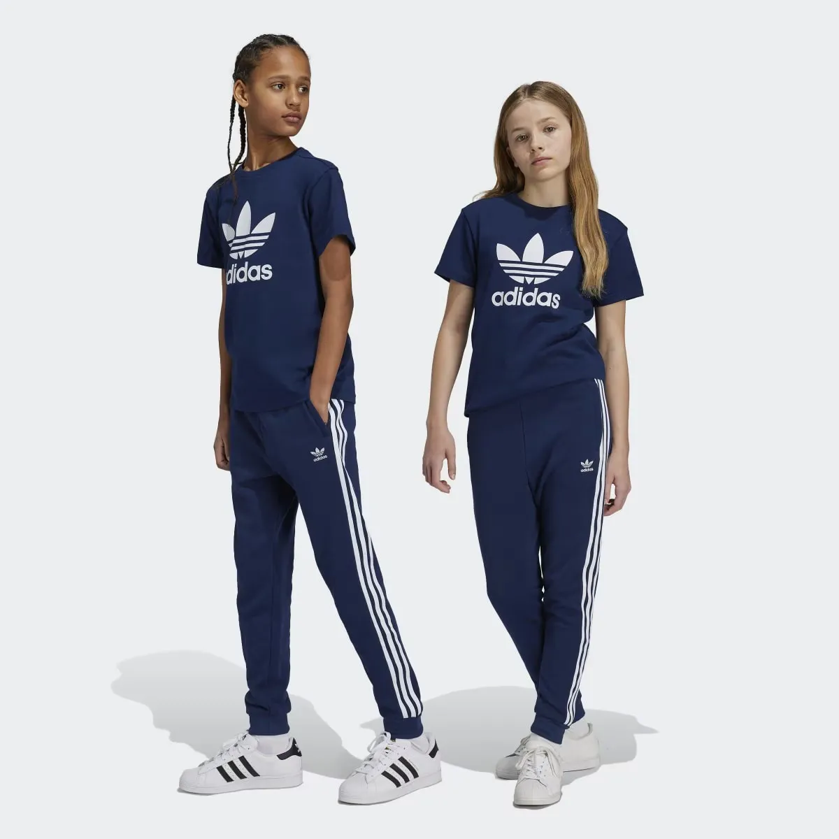 

Трилистник Adidas Originals детские брюки, тёмно-синий