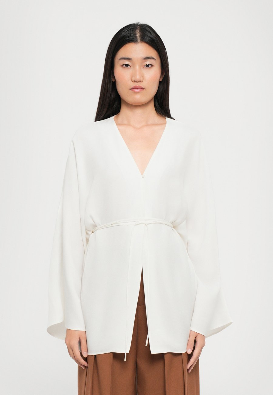 

Блуза Rodebjer GLORY, Gardenia Cream/White