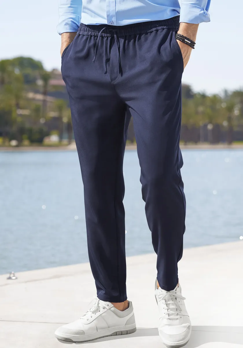 

Брюки John Devin Jogger "Jogg Pants", облегающего кроя, из легкой качественной ткани, цвет морской волны