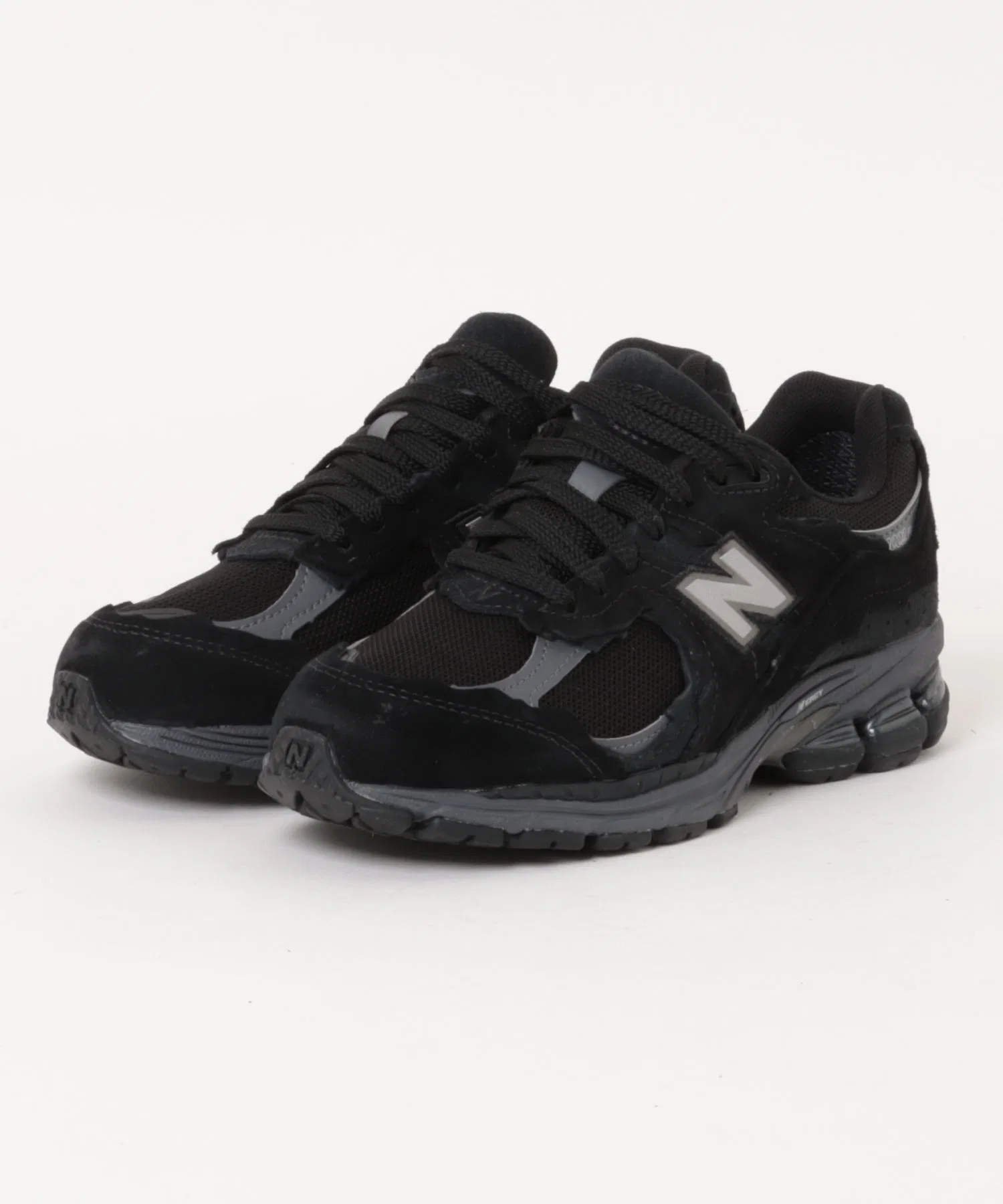 Мужские кроссовки New Balance U2002 из кожи и сетки чёрные