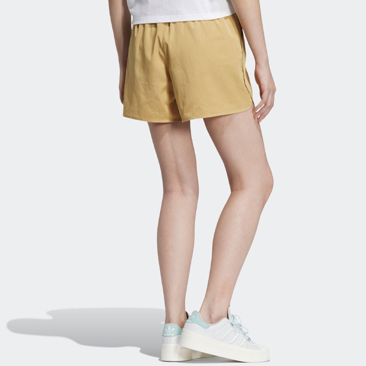 Женские спортивные шорты Adidas Originals светло-золотистого белого цвета — фото 4