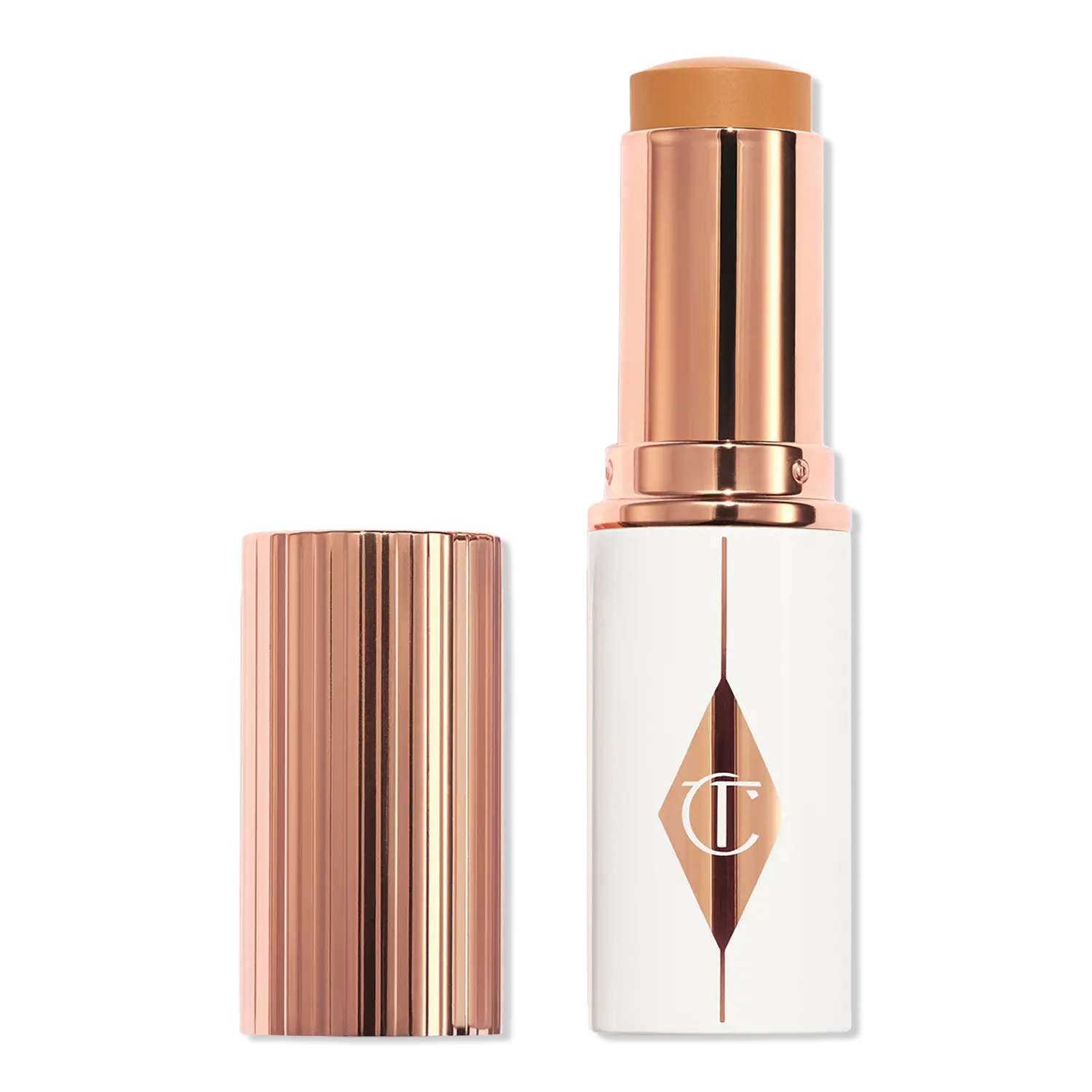 

Увлажняющий тональный крем-стик Unreal Skin Sheer Glow Tint Charlotte Tilbury, 10 Tan (tan with warm undertones)