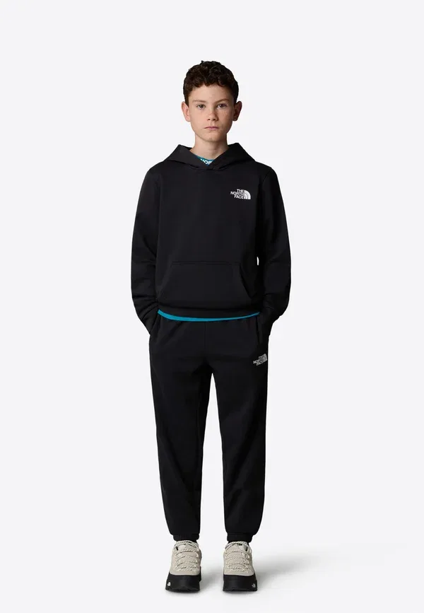 Штаны спортивные зауженные The North Face, цвет черный