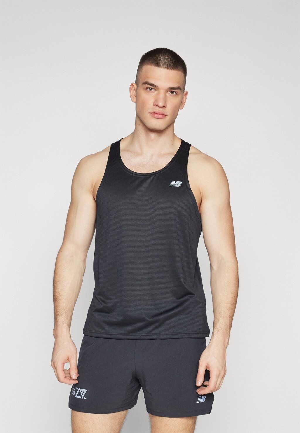 

Топ SPORT ESSENTIALS SINGLET New Balance, черный