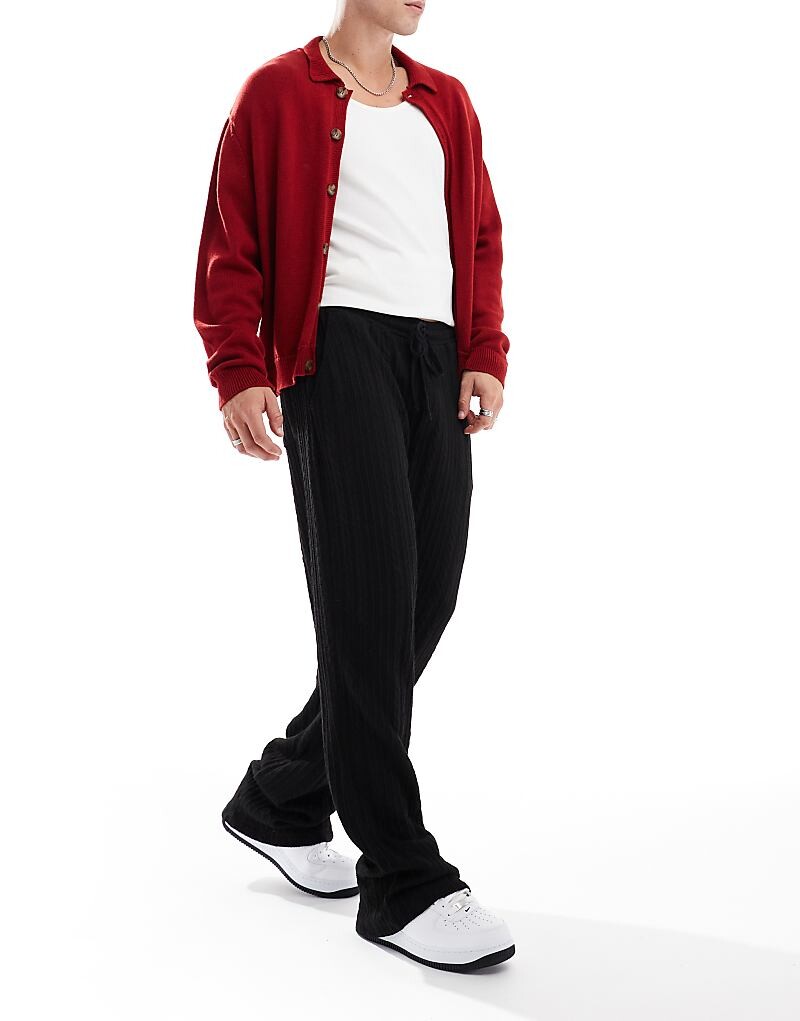 

Черные широкие трикотажные брюки ASOS DESIGN