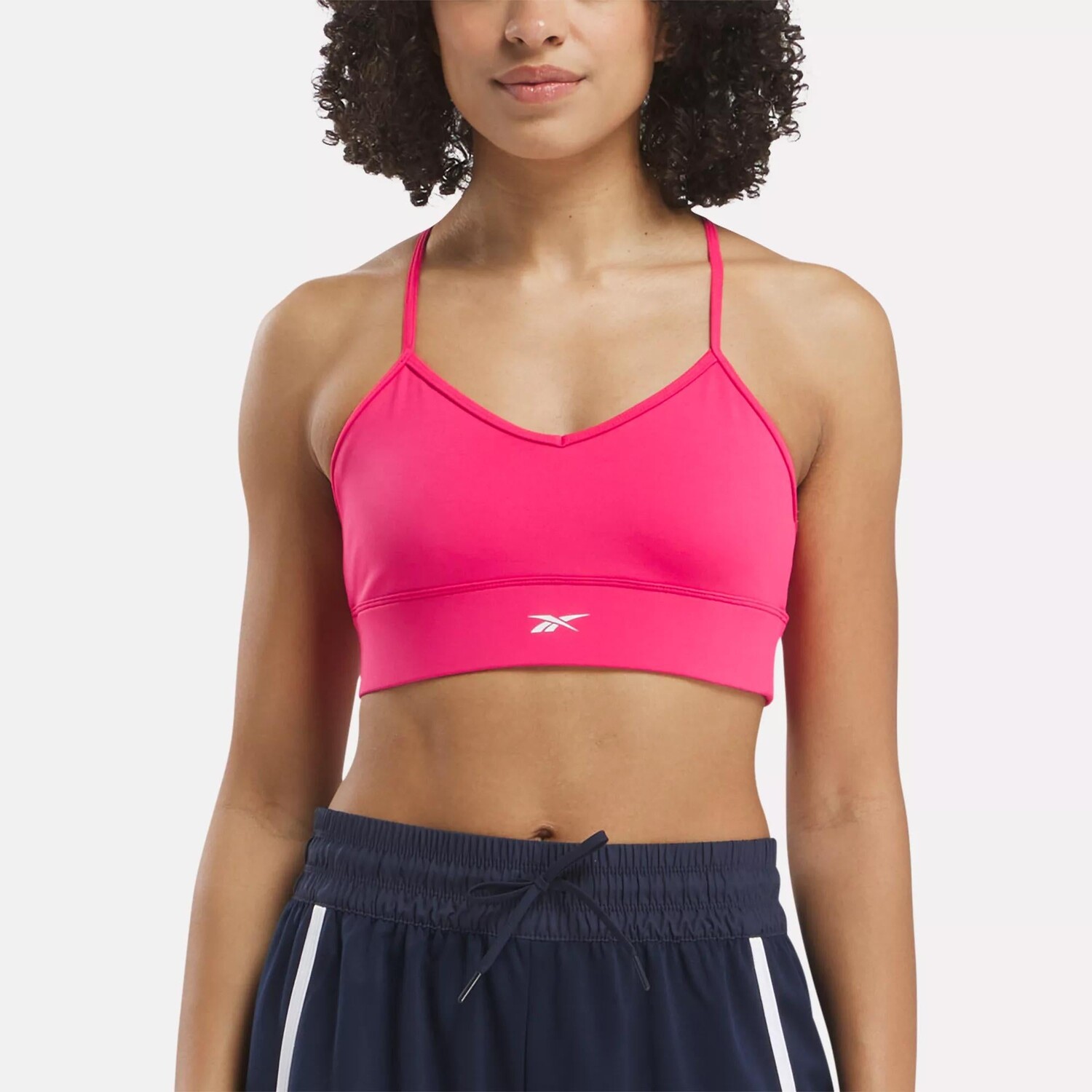 

Спортивный бюстгальтер для тренировок Reebok, цвет Bold Pink