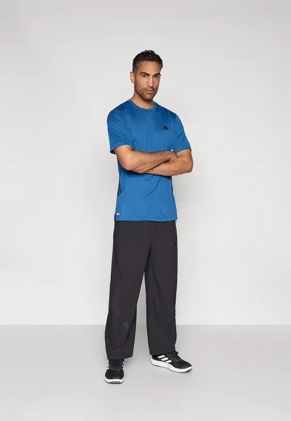 Спортивные штаны Adidas z.n.e. woven tracksuit bottoms Adidas Sportswear, черный — фото 2
